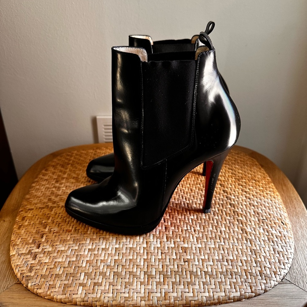 Christian Louboutin’s Black leather ankle boots.  Great condition.
